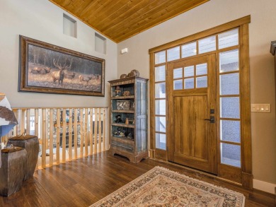 Nestled on an expansive 1.9-acre lot surrounded by whispering on Angel Fire Resort Country Club in New Mexico - for sale on GolfHomes.com, golf home, golf lot