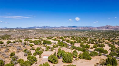 Views! This beautiful home, perched on the highest hill in on Pueblo de Cochiti Golf Course in New Mexico - for sale on GolfHomes.com, golf home, golf lot