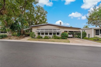 A TRULY INCREDIBLE OPPORTUNITY! This sunny Tarpon Springs gem of on Tarpon Springs Golf Course in Florida - for sale on GolfHomes.com, golf home, golf lot