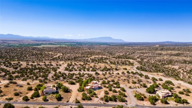 Views! This beautiful home, perched on the highest hill in on Pueblo de Cochiti Golf Course in New Mexico - for sale on GolfHomes.com, golf home, golf lot