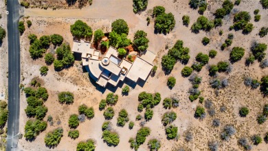 Views! This beautiful home, perched on the highest hill in on Pueblo de Cochiti Golf Course in New Mexico - for sale on GolfHomes.com, golf home, golf lot