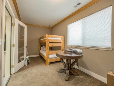 Nestled on an expansive 1.9-acre lot surrounded by whispering on Angel Fire Resort Country Club in New Mexico - for sale on GolfHomes.com, golf home, golf lot