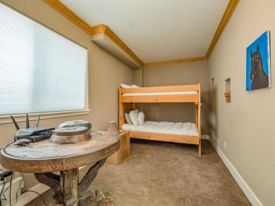 Nestled on an expansive 1.9-acre lot surrounded by whispering on Angel Fire Resort Country Club in New Mexico - for sale on GolfHomes.com, golf home, golf lot
