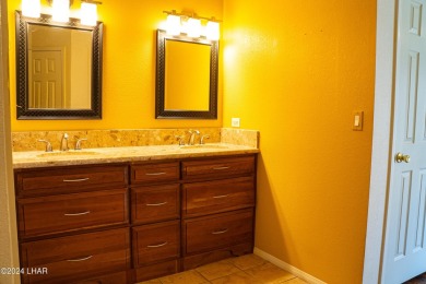Furnished one level condo with attached garage on the golf on London Bridge Golf Course in Arizona - for sale on GolfHomes.com, golf home, golf lot