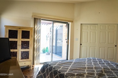 Furnished one level condo with attached garage on the golf on London Bridge Golf Course in Arizona - for sale on GolfHomes.com, golf home, golf lot