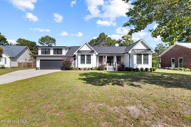 Modern Coastal Living Just Minutes from Wrightsville Beach on Inland Greens Golf Course in North Carolina - for sale on GolfHomes.com, golf home, golf lot