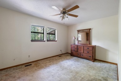 Discover a charming fixer-upper nestled in a secluded, quiet on Mountain Ranch Golf Club in Arkansas - for sale on GolfHomes.com, golf home, golf lot