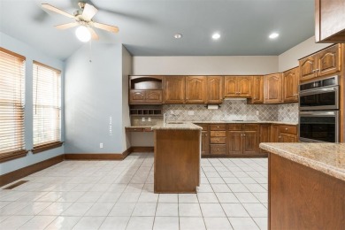 Welcome to the definition of relaxation and comfort at 607 on Oak Tree National Golf and Country Club in Oklahoma - for sale on GolfHomes.com, golf home, golf lot