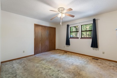 Discover a charming fixer-upper nestled in a secluded, quiet on Mountain Ranch Golf Club in Arkansas - for sale on GolfHomes.com, golf home, golf lot