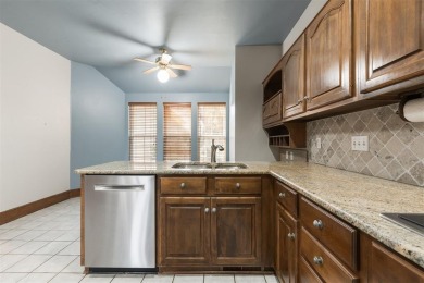 Welcome to the definition of relaxation and comfort at 607 on Oak Tree National Golf and Country Club in Oklahoma - for sale on GolfHomes.com, golf home, golf lot
