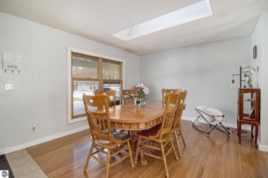 Discover comfort and convenience in this well-maintained on Bear Lake Highlands Golf Course in Michigan - for sale on GolfHomes.com, golf home, golf lot