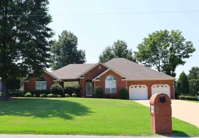 Experience the epitome of luxury in this stunning 4-bedroom, 2 on Paragould Country Club in Arkansas - for sale on GolfHomes.com, golf home, golf lot