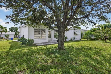 Spacious 2 bed/2 bath home with large family room and 1 car on Leisureville Community Association in Florida - for sale on GolfHomes.com, golf home, golf lot