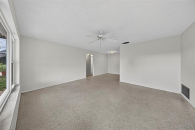 Spacious 2 bed/2 bath home with large family room and 1 car on Leisureville Community Association in Florida - for sale on GolfHomes.com, golf home, golf lot