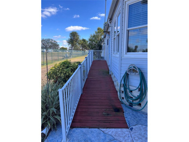 Welcome to resort-style living at Golf Lakes Residents Co-Op, a on Heather Hills Golf Course in Florida - for sale on GolfHomes.com, golf home, golf lot