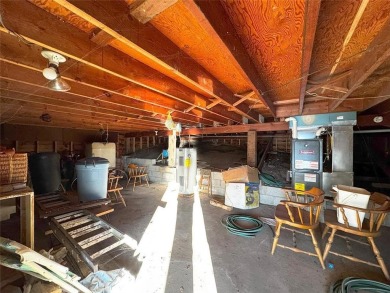 Mid Century Modern Lake Cottage! Private Golf Course Out Front on Eshquaguma Country Club in Minnesota - for sale on GolfHomes.com, golf home, golf lot