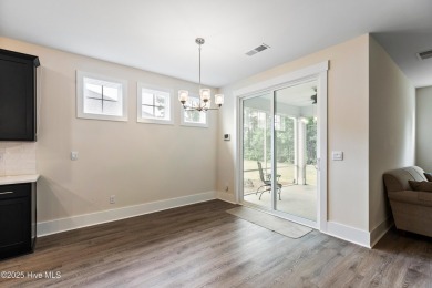 Welcome to a home where timeless elegance meets modern ease--The on Cape Fear National At Brunswick Forest in North Carolina - for sale on GolfHomes.com, golf home, golf lot