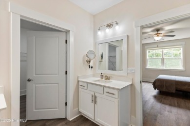 Welcome to a home where timeless elegance meets modern ease--The on Cape Fear National At Brunswick Forest in North Carolina - for sale on GolfHomes.com, golf home, golf lot