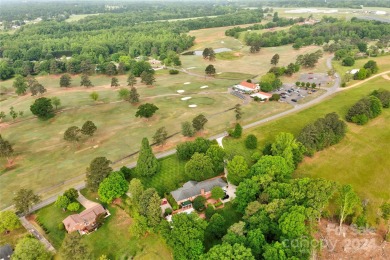 STUNNING ALL-BRICK 5-BEDROOM HOME on the golf course with a on River Bend YMCA Golf Course in North Carolina - for sale on GolfHomes.com, golf home, golf lot