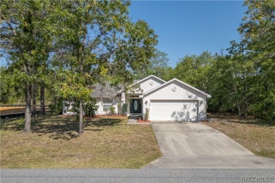 Welcome to this stunning split-floor home in the heart of on Sugarmill Woods Golf and Country Club in Florida - for sale on GolfHomes.com, golf home, golf lot