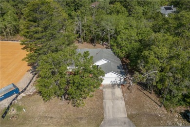 Welcome to this stunning split-floor home in the heart of on Sugarmill Woods Golf and Country Club in Florida - for sale on GolfHomes.com, golf home, golf lot