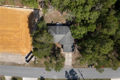 Welcome to this stunning split-floor home in the heart of on Sugarmill Woods Golf and Country Club in Florida - for sale on GolfHomes.com, golf home, golf lot