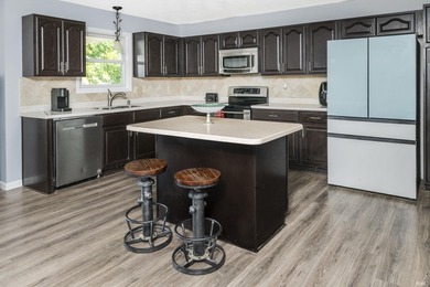 Welcome to 8892 S Aster Ct, a beautifully maintained home where on The Eagle Pointe Golf Resort in Indiana - for sale on GolfHomes.com, golf home, golf lot