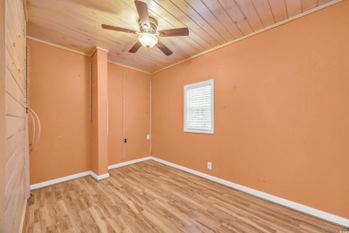 Located in the sought-after Creekside community in North Myrtle on Tidewater Golf Club and Plantation in South Carolina - for sale on GolfHomes.com, golf home, golf lot