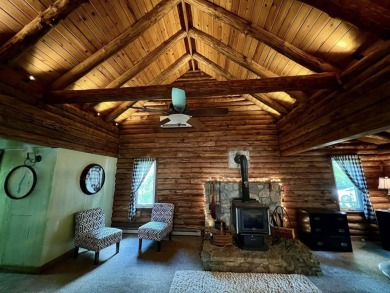 Welcome to this authentic Cape Cod-style log cabin in the heart on Apple Valley Golf Course in Ohio - for sale on GolfHomes.com, golf home, golf lot