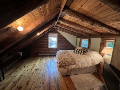 Welcome to this authentic Cape Cod-style log cabin in the heart on Apple Valley Golf Course in Ohio - for sale on GolfHomes.com, golf home, golf lot