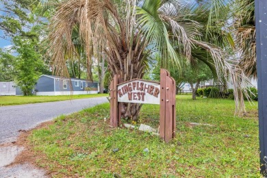 Located in the sought-after Creekside community in North Myrtle on Tidewater Golf Club and Plantation in South Carolina - for sale on GolfHomes.com, golf home, golf lot