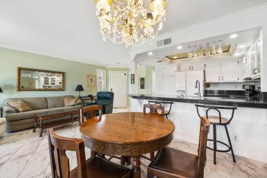 ? Just steps from the Indian Wells Tennis Garden, this condo on Palm Royale Country Club in California - for sale on GolfHomes.com, golf home, golf lot