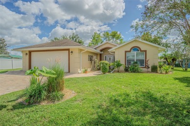 PICTURE PERFECT and perched on a large, serene POND, this on Tampa Bay Golf and Country Club in Florida - for sale on GolfHomes.com, golf home, golf lot