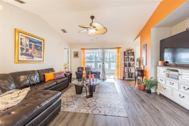 PICTURE PERFECT and perched on a large, serene POND, this on Tampa Bay Golf and Country Club in Florida - for sale on GolfHomes.com, golf home, golf lot