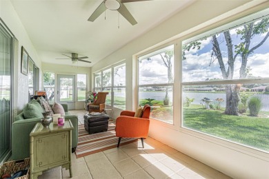 PICTURE PERFECT and perched on a large, serene POND, this on Tampa Bay Golf and Country Club in Florida - for sale on GolfHomes.com, golf home, golf lot