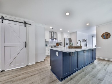 Wake up to breathtaking lake views, glowing sunsets, and on The Highlands Course at Lake Arrowhead in Georgia - for sale on GolfHomes.com, golf home, golf lot