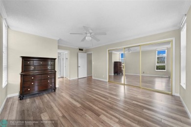 Experience the best of Florida living in this stunning home on Palm-Aire Country Club and Resort - Palms in Florida - for sale on GolfHomes.com, golf home, golf lot