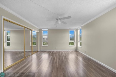 Experience the best of Florida living in this stunning home on Palm-Aire Country Club and Resort - Palms in Florida - for sale on GolfHomes.com, golf home, golf lot