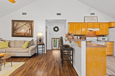 Welcome to your turn-key retreat in the heart of East Texas! on Holly Lake Ranch Golf Club in Texas - for sale on GolfHomes.com, golf home, golf lot