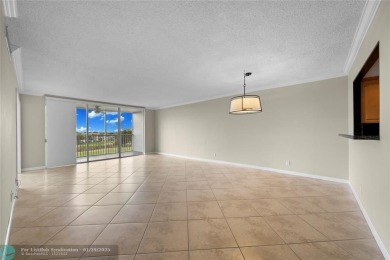 Experience the best of Florida living in this stunning home on Palm-Aire Country Club and Resort - Palms in Florida - for sale on GolfHomes.com, golf home, golf lot