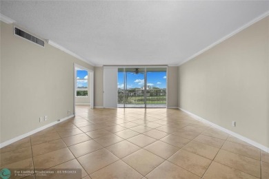 Experience the best of Florida living in this stunning home on Palm-Aire Country Club and Resort - Palms in Florida - for sale on GolfHomes.com, golf home, golf lot