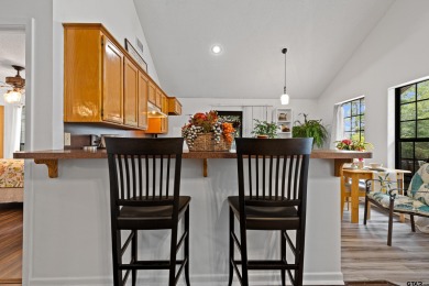 Welcome to your turn-key retreat in the heart of East Texas! on Holly Lake Ranch Golf Club in Texas - for sale on GolfHomes.com, golf home, golf lot