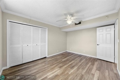 Experience the best of Florida living in this stunning home on Palm-Aire Country Club and Resort - Palms in Florida - for sale on GolfHomes.com, golf home, golf lot