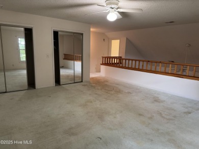 A 4-bedroom Club Villa is now available within Sea Trail on Sea Trail Golf Resort in North Carolina - for sale on GolfHomes.com, golf home, golf lot