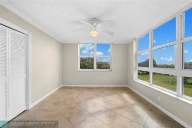 Experience the best of Florida living in this stunning home on Palm-Aire Country Club and Resort - Palms in Florida - for sale on GolfHomes.com, golf home, golf lot