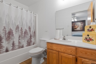 Welcome to your turn-key retreat in the heart of East Texas! on Holly Lake Ranch Golf Club in Texas - for sale on GolfHomes.com, golf home, golf lot