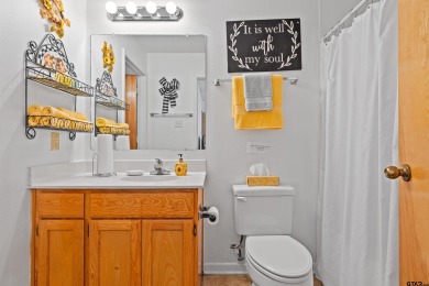 Welcome to your turn-key retreat in the heart of East Texas! on Holly Lake Ranch Golf Club in Texas - for sale on GolfHomes.com, golf home, golf lot