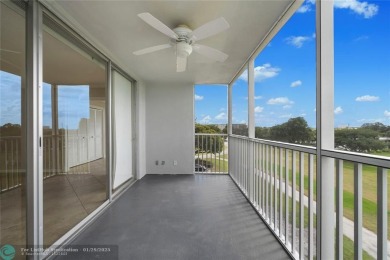 Experience the best of Florida living in this stunning home on Palm-Aire Country Club and Resort - Palms in Florida - for sale on GolfHomes.com, golf home, golf lot