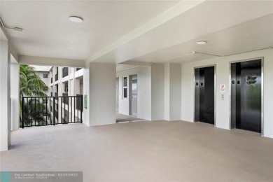 Experience the best of Florida living in this stunning home on Palm-Aire Country Club and Resort - Palms in Florida - for sale on GolfHomes.com, golf home, golf lot