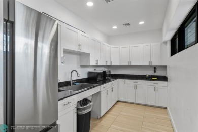 Experience the best of Florida living in this stunning home on Palm-Aire Country Club and Resort - Palms in Florida - for sale on GolfHomes.com, golf home, golf lot